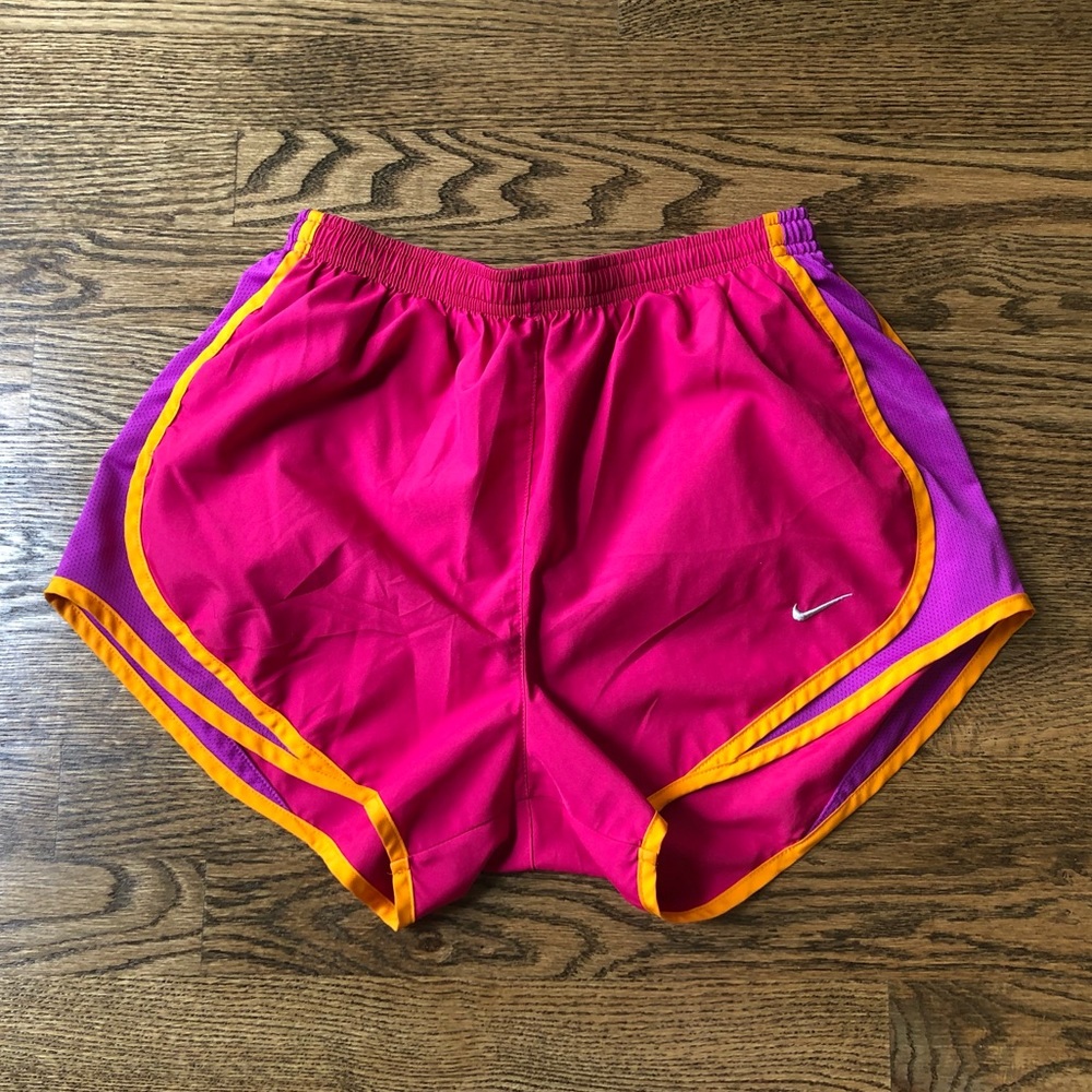 Nike Dri-Fit athletic shorts, size small, pink and purple